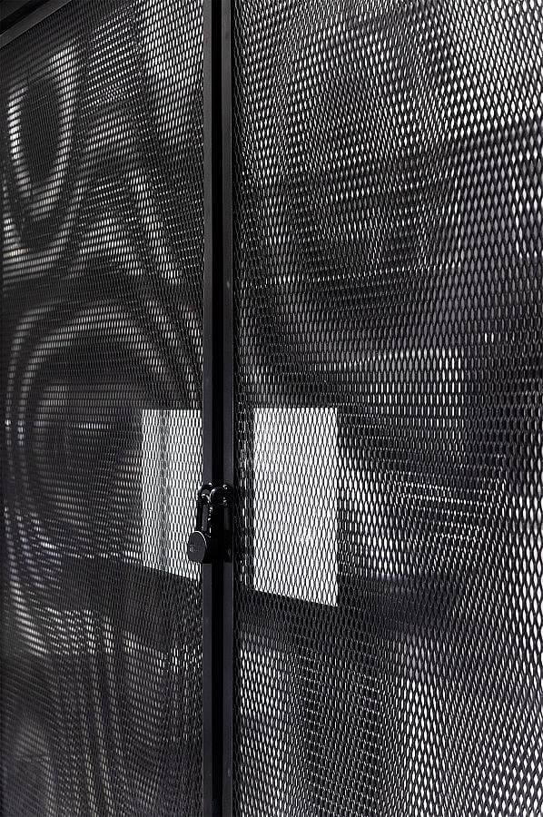 Installation view of the exterior of Solivagant NYC (approx 96 x 96 inches in two parts)